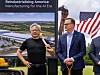 Jensen Huang og Jim Anderson står ved en grunnsteinsmarkering foran et amerikansk flagg og et skilt for Coherent.