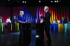 Kirsti Bergstø og Jonas Gahr Støre står ved podier under en TV-sendt partilederdebatt i Arendal.