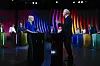 Kirsti Bergstø og Jonas Gahr Støre står ved podier under en TV-sendt partilederdebatt i Arendal.