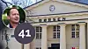 Portrett av en mann foran Børsen, med tallet 41 i en lilla sirkel.