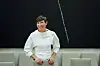 Ine Eriksen Søreide sitter på en lys sofa under en åpen høring i Stortinget.
