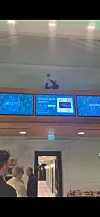 Oslo Børs med tre digitale skjermer, som anonserer seier for Radionor